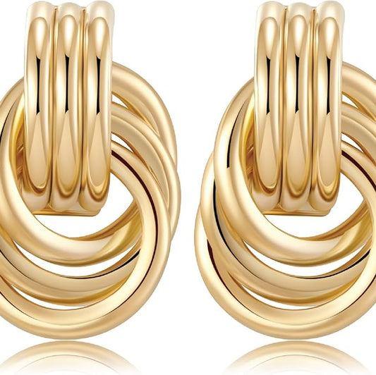 Bold yet elegant gold-tone knot earrings